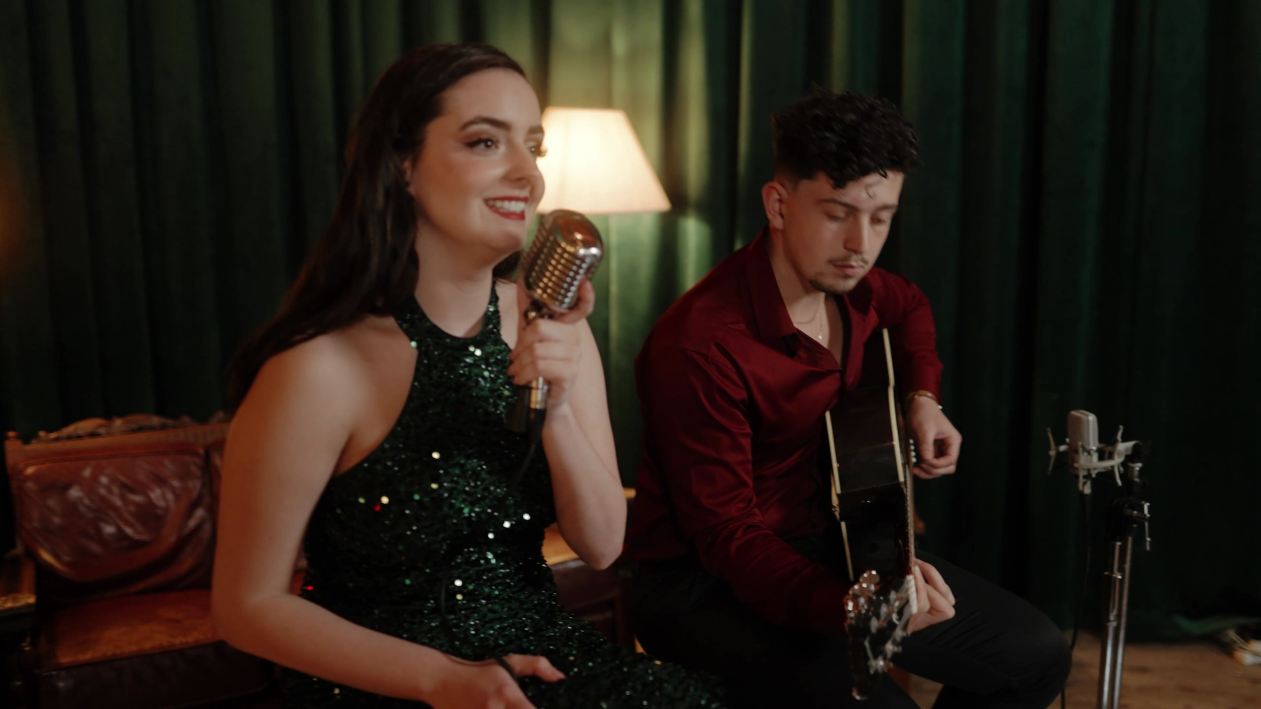 Abbey and her guitarist performing as an acoustic duo